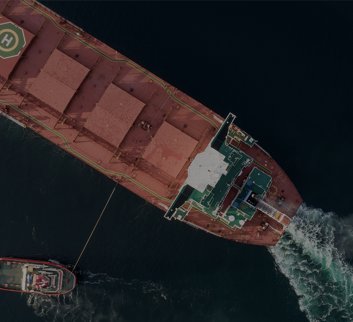 Overhead visual of vessel with tug boat