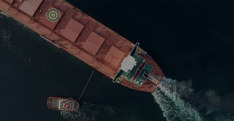 Overhead visual of vessel with tug boat