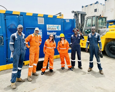 Group of people from Scantech Offshore standing outside