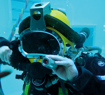 Close up of a diver using JFD's Compact Bailout Rebreathing Apparatus (COBRA)
