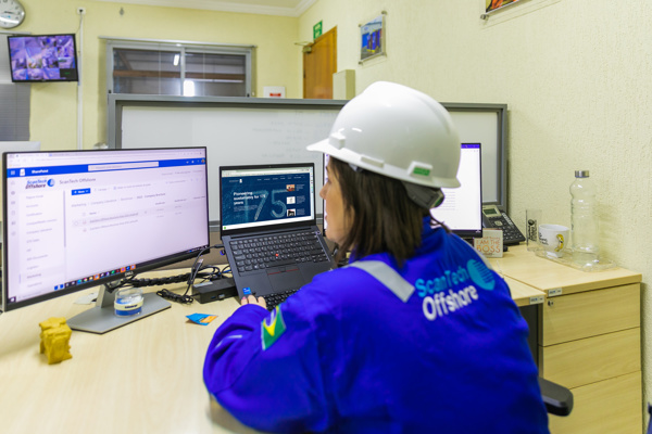 Scantech offshore working at computers